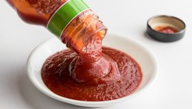Close-Up Of Ketchup Over White Background