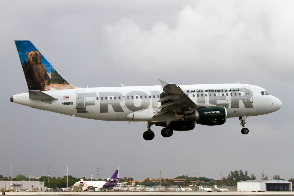 A Frontier Airlines Airbus 319 lands at Miami International...