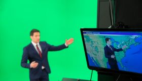 Weather forecaster on green background