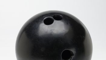 old bowling ball cut out on white background