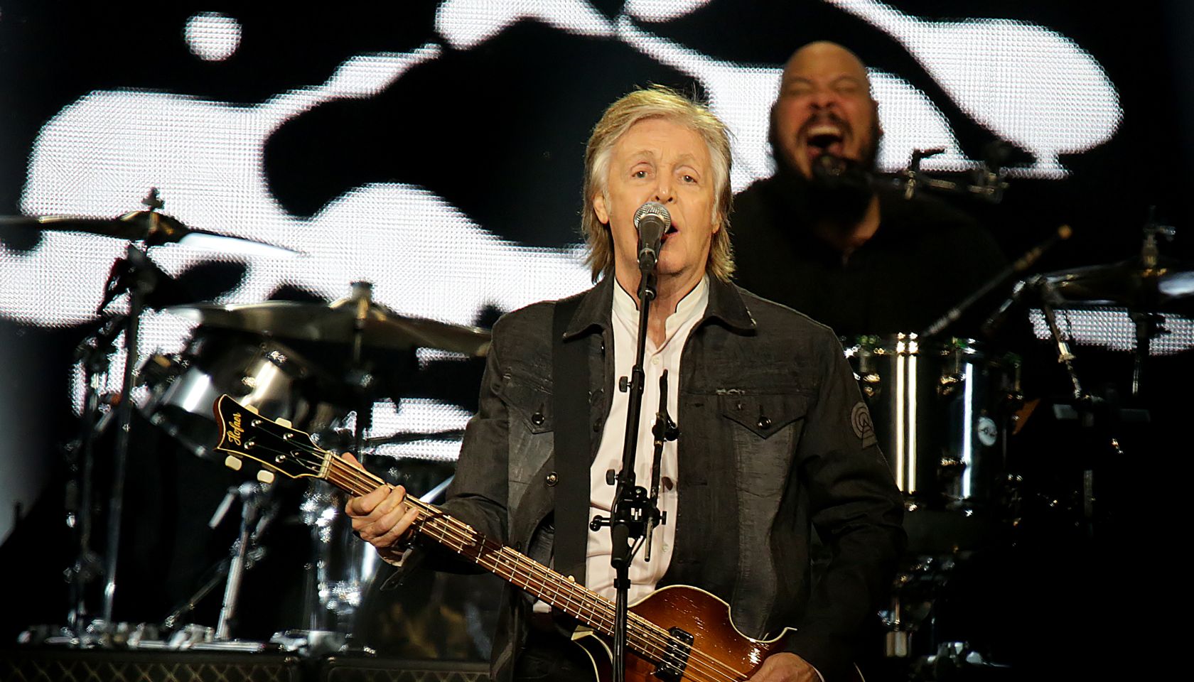 Paul McCartney performing at Liverpool Echo Arena