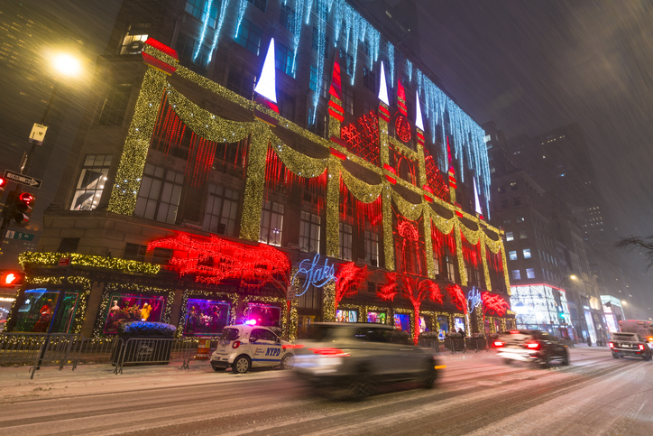 Saks Fifth Avenue's Christmas Lights Show during First major winter snowstorm hits New York City during the Pandemic of COVID-19
