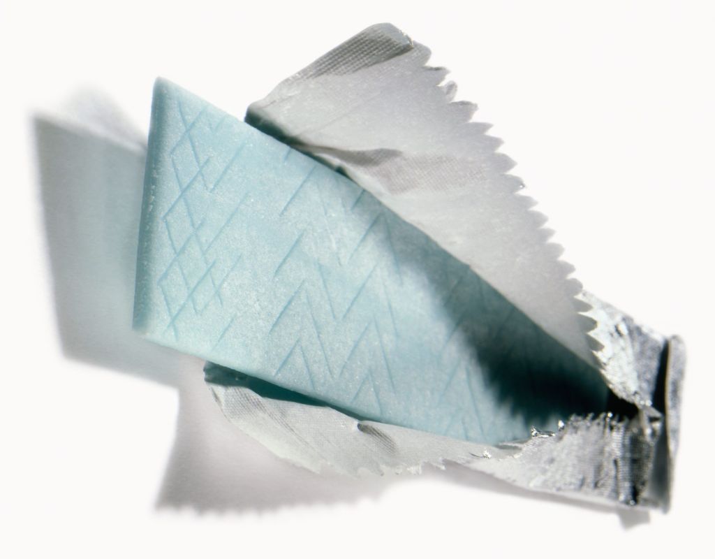 Chewing gum in foil, studio shot, close-up