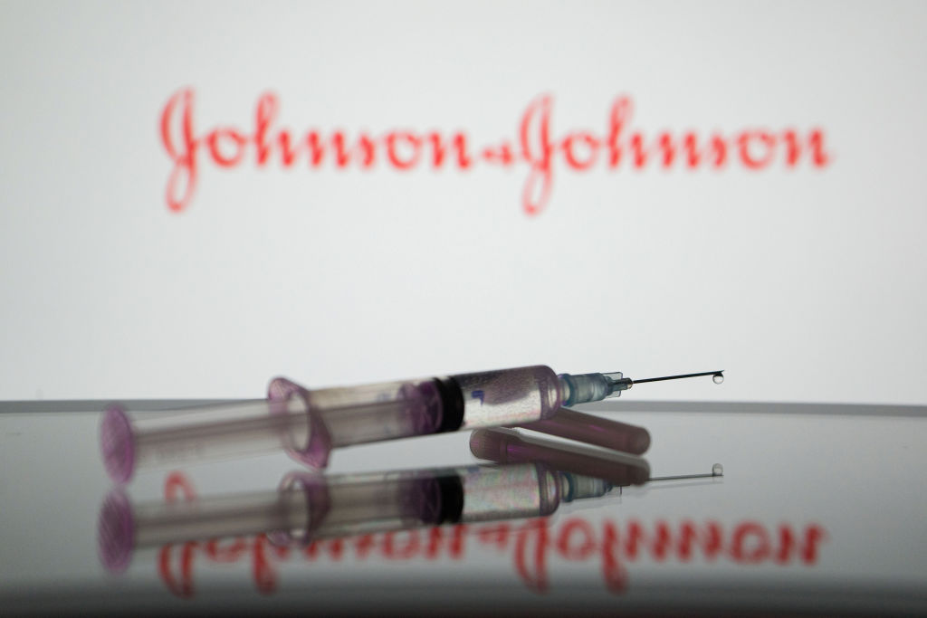 In this photo illustration, a medical syringe is displayed...