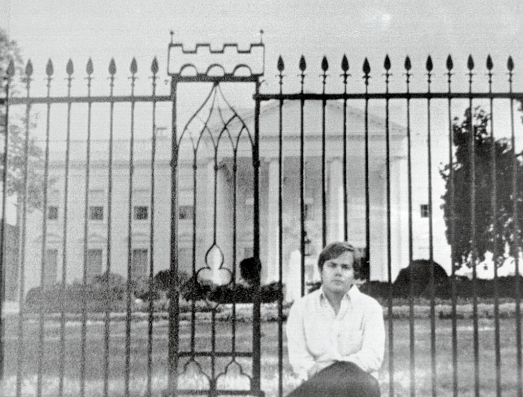 John Hinckley Jr. Posing in Front of White House