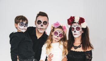 Halloween family portrait with the day of the dead facial makeup
