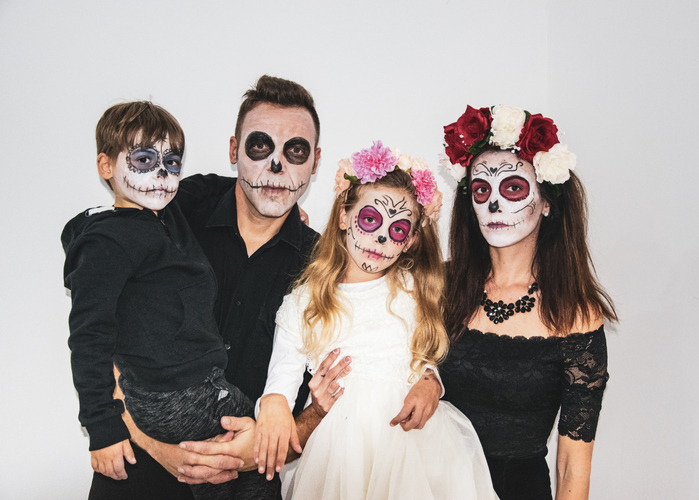Halloween family portrait with the day of the dead facial makeup
