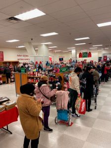 Long line of shoppers at check-out in TJ Maxx store on black Friday, Queens, New York