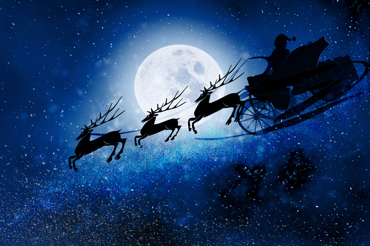 Santa Claus with sleigh and reindeers