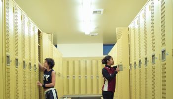 Teenage girls (15-17) in high school locker room