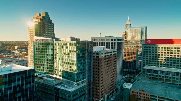 Sun Glinting on Downtown Office Towers in Raleigh, NC - Aerial