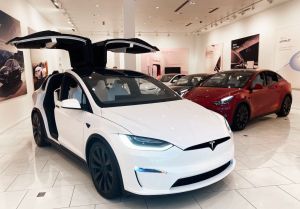 Vehicles are seen in a Tesla showroom in Orlando...