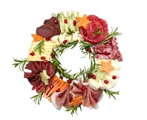 Appetizers boards with assorted cheese, meat, grape and nuts. Charcuterie and cheese platter. Top view. Isolated on white. Christmas wreath