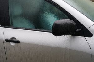 car coated ice crust during the icy rain in cold weather