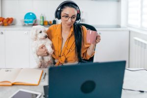 Freelancer managing work-life balance with a pet