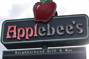 Applebee's Neighborhood Grill & Bar sign with burned out lights - August 2021