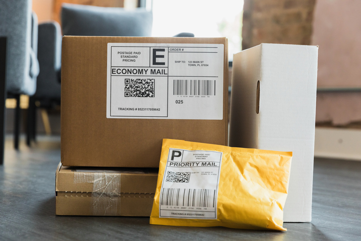 Shipping Packages: Cardboard Boxes and Priority Mail Envelope